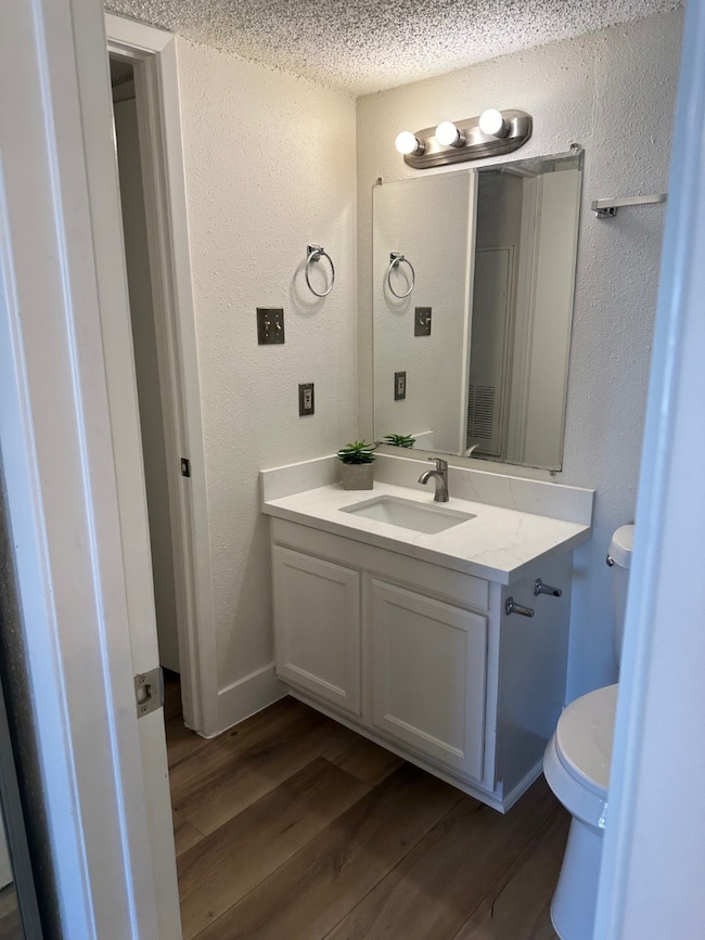 Guest bath downstairs. Quartz countertop, toilet,