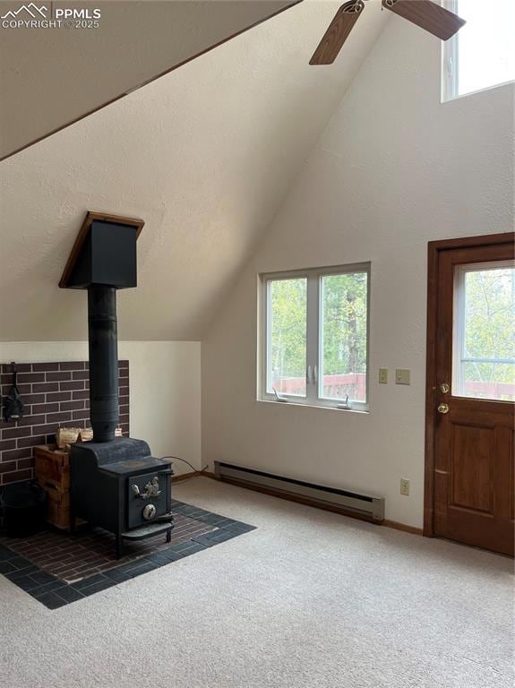 Sports a nice wood stove and walk out to deck