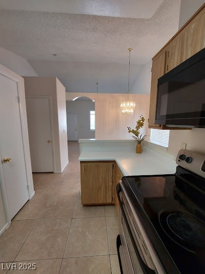 Kitchen featuring stainless steel electric stove,