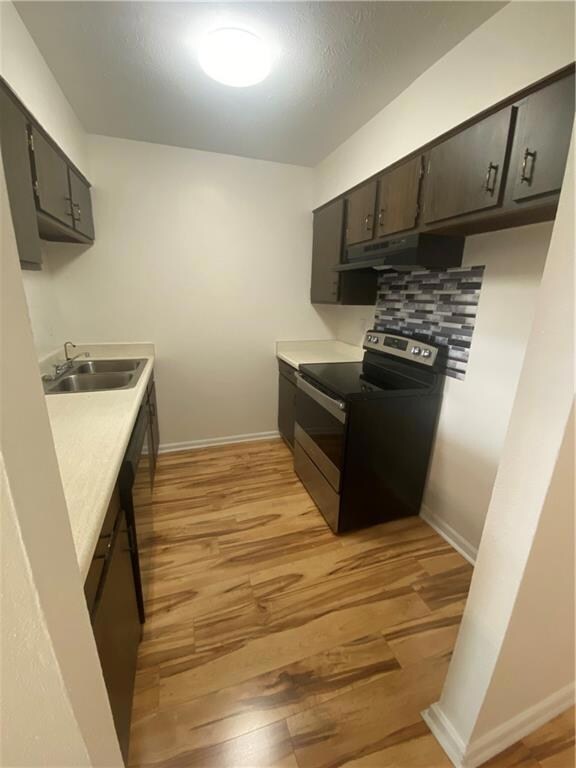 kitchen with range/oven and dishwasher