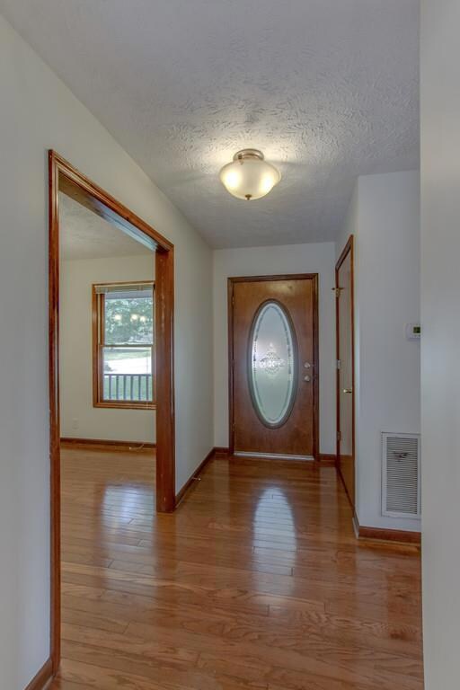 Hardwoods from entry into formal dining, kitchen, and great room!