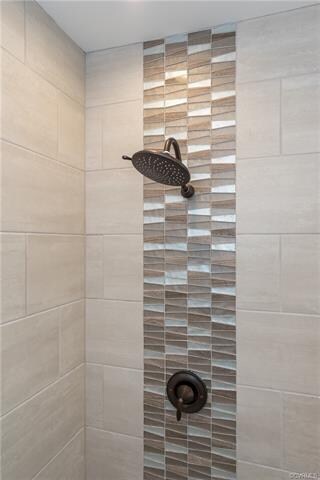 Beautiful listello tile accent in master shower