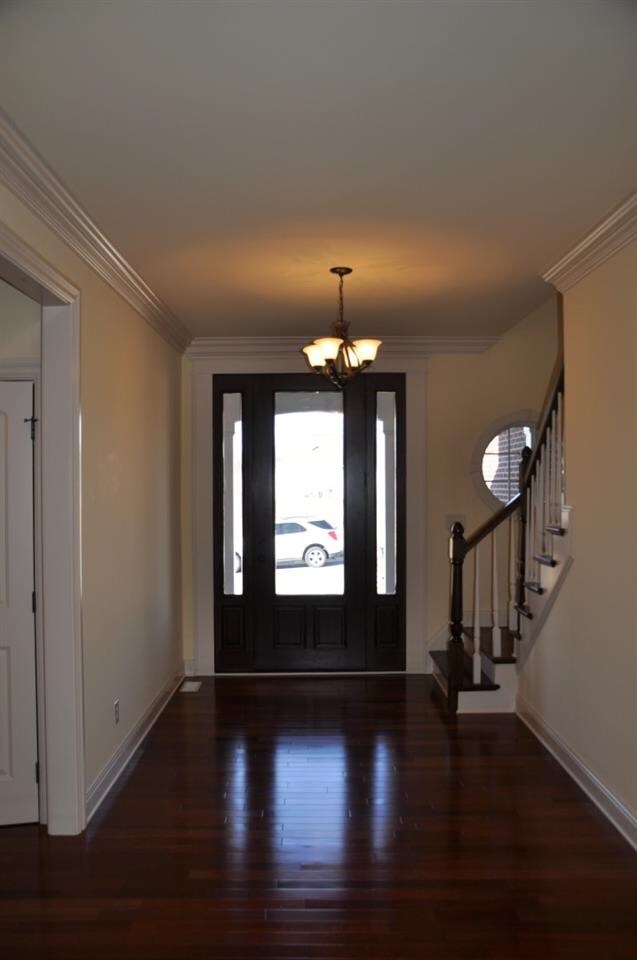 The foyer has Brazilian cherry floors.