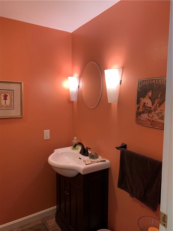 Great decor in the updated half bath!