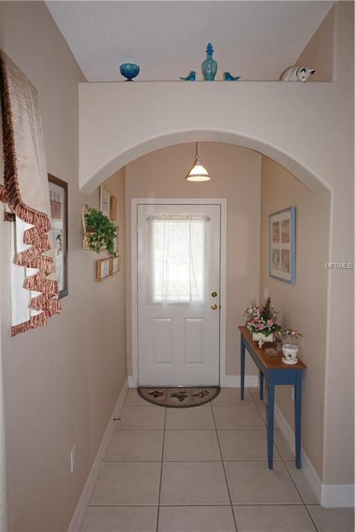 Glass door entry way brings in the natural light.