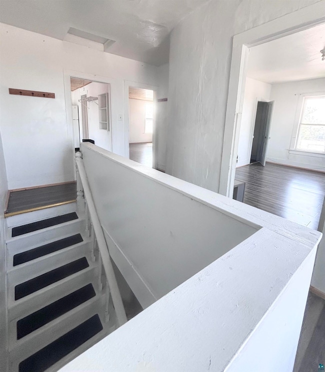 Staircase with wood finished floors