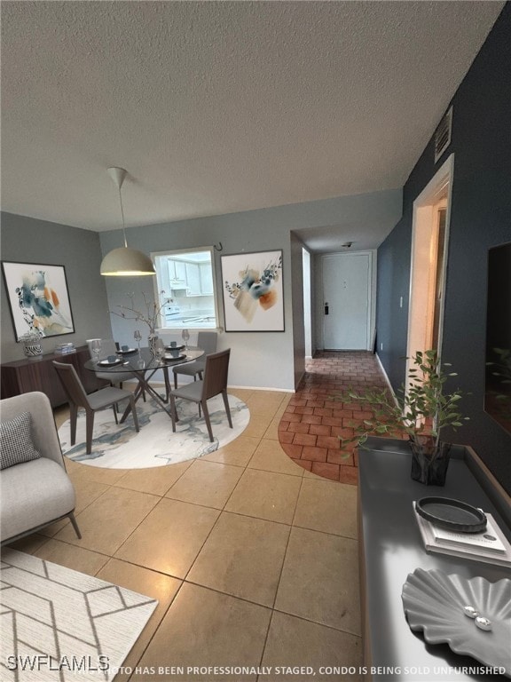 LIVING ROOM AREA THAT LEADS INTO THE DINING ROOM