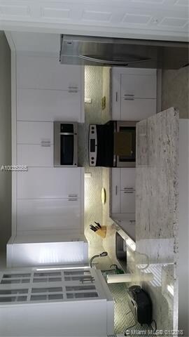 Kitchen with upgraded cabinets, granite counter, d