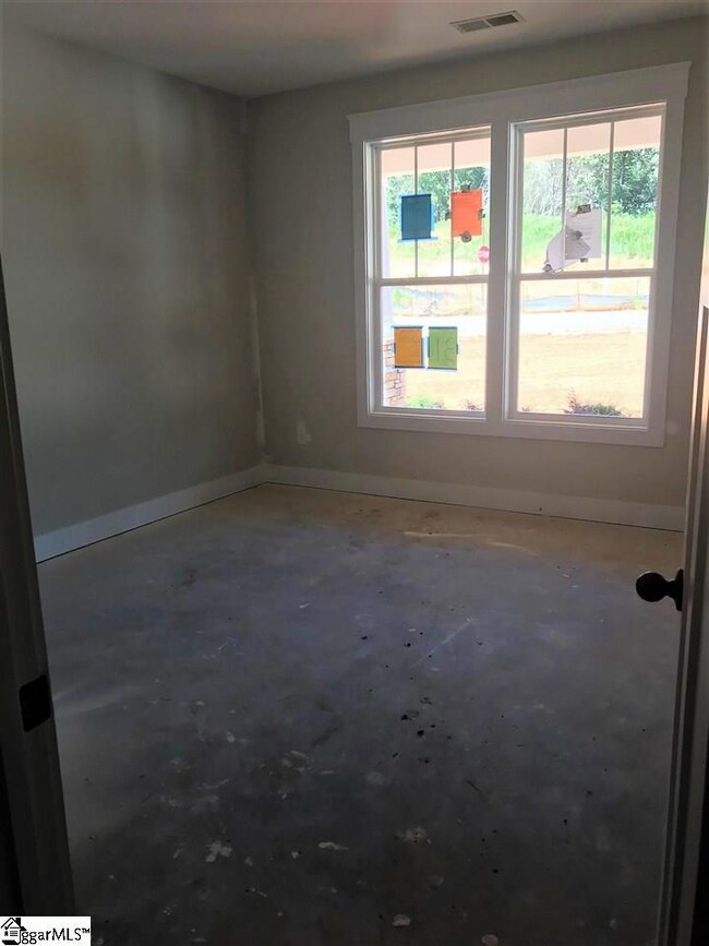 Front secondary bedroom with private access to ful