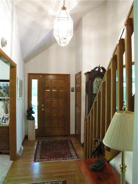 Spacious Entry with Custom Door