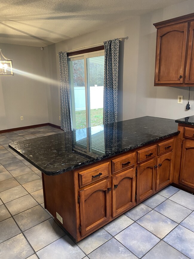 This end of the kitchen offers a breakfast bar space