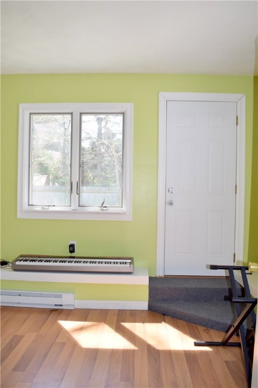 Sunroom off garage leading to back yard