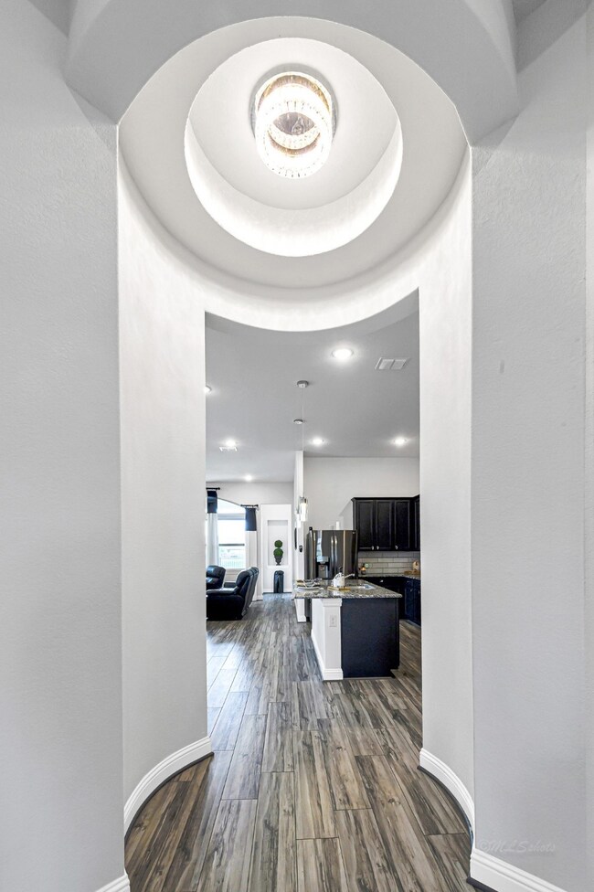 Another view of the rotunda leading to the open concept living area.
