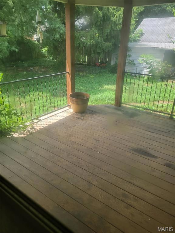 Wooden deck with a lawn