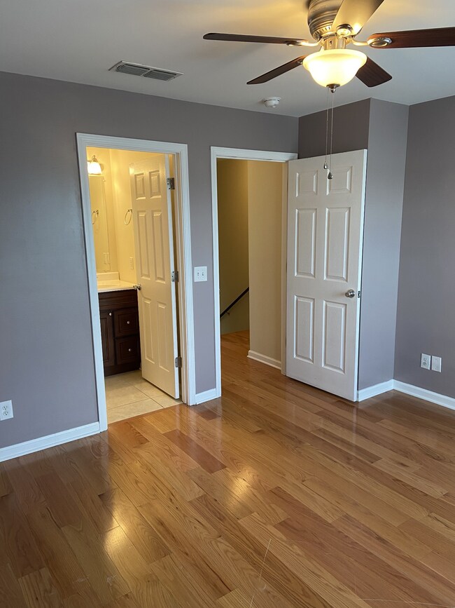  Bedroom #1 with private full bath,Laminate hardwood floors, Large closet, fresh paint