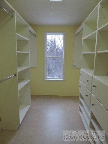 Master Closet: Customizable shelving, drawers and