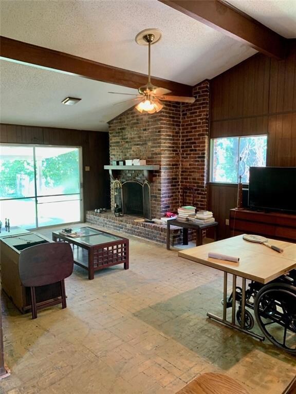 Den with fireplace