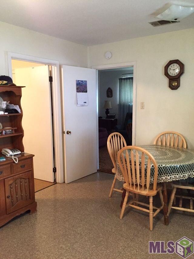 There is lots of space for a breakfast table.