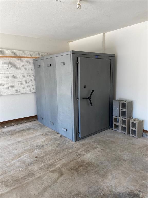 Large storm shelter in garage.