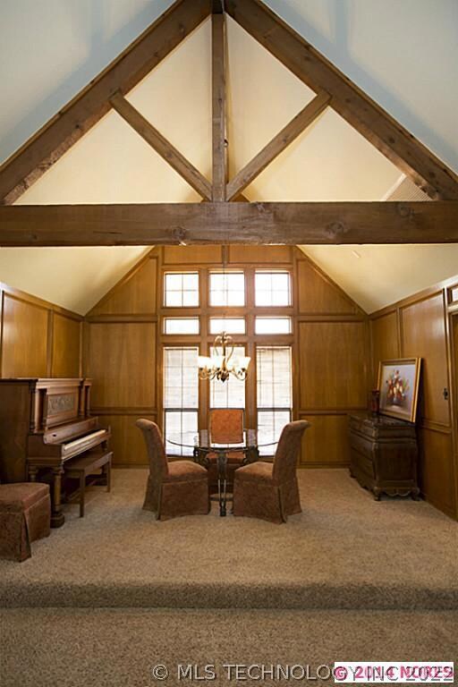 Raised floor, block paneled formal dining has view