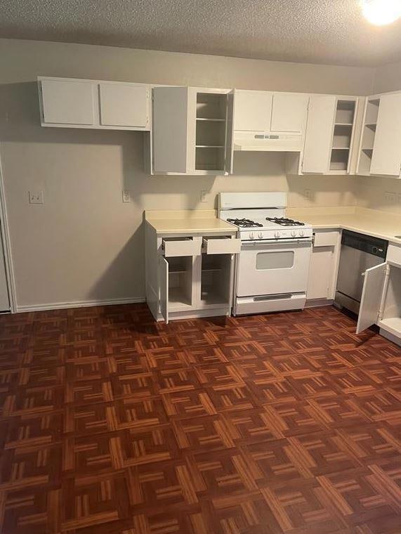 Kitchen with gas range gas stove, light counterto