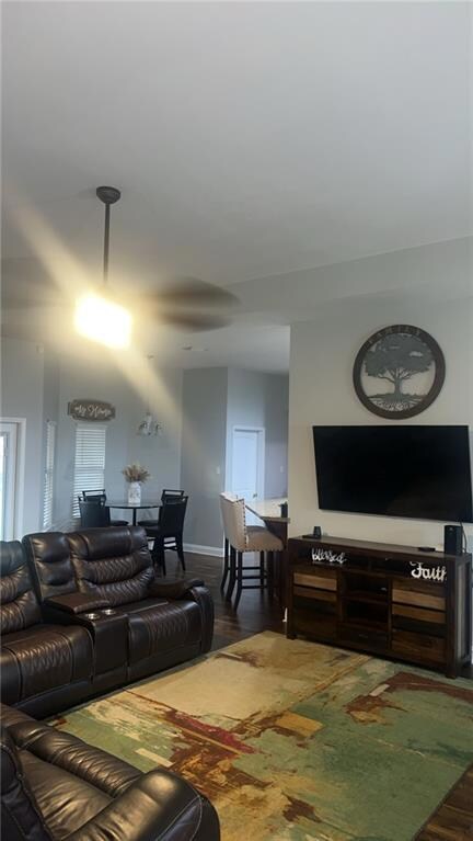 Living area featuring wood finished floors