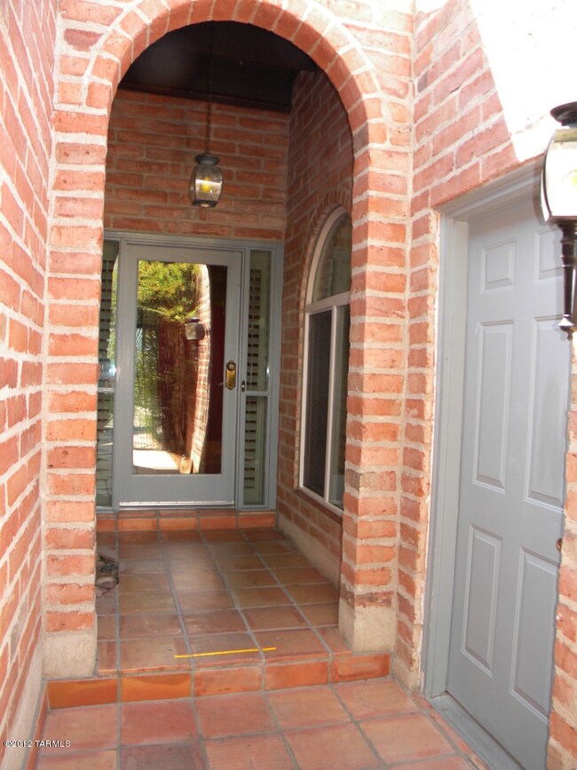 Courtyard has garage entrance