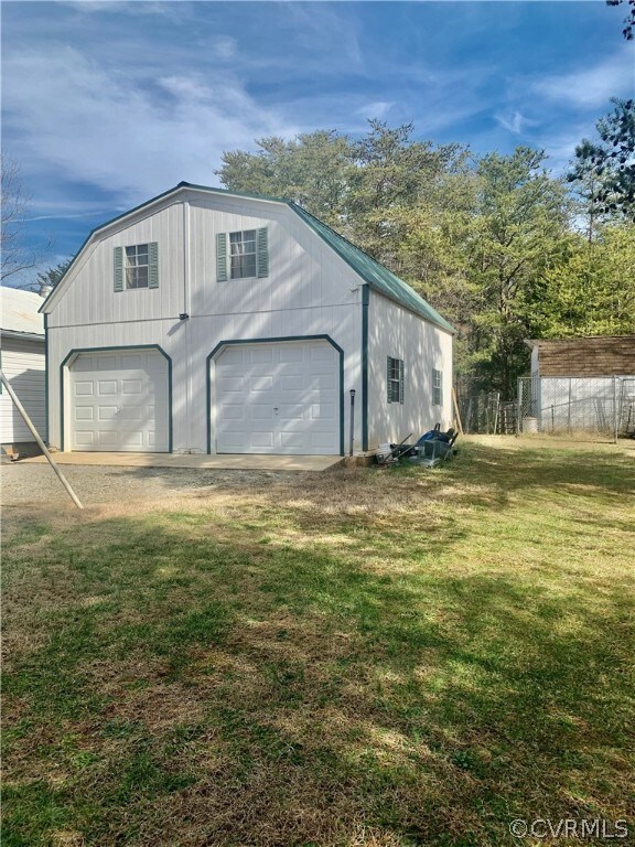 24x24 Detached Garage with a room and bath upstair