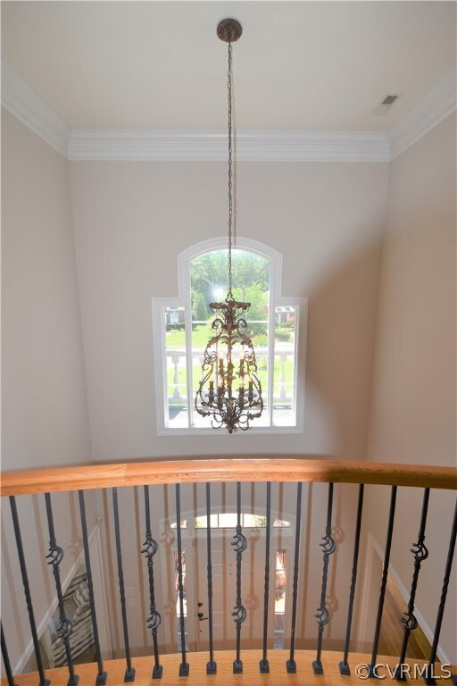 Palladian window and large chandelier in the Foyer