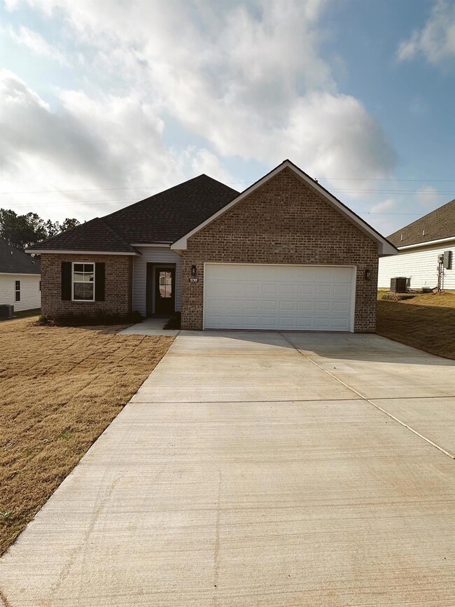 Ranch-style home with a garage
