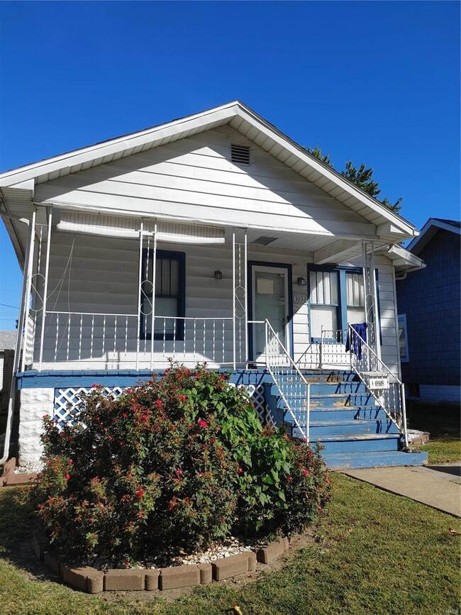 LARGE COVERED FRONT PORCH