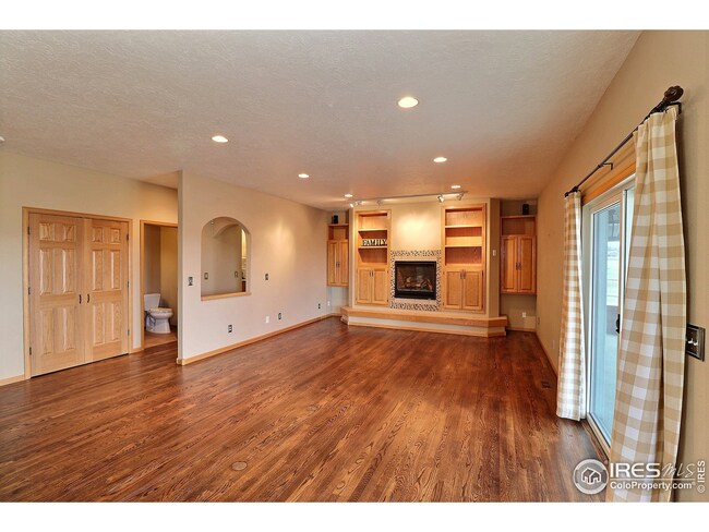 Living Room with Gas Fireplace and Built-In's
