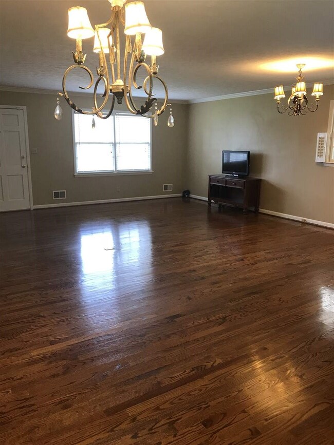 Beautiful oak hard wood floor!  View of living roo