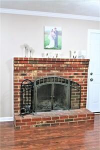 family room w/woodburning fireplace