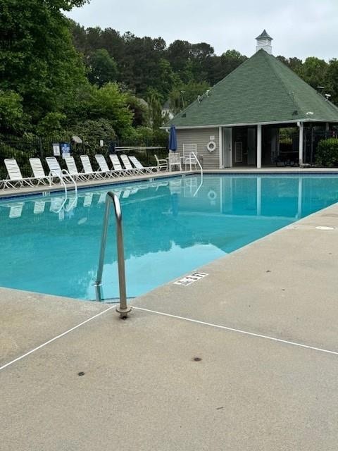 Community pool, steps away and ready for you to en