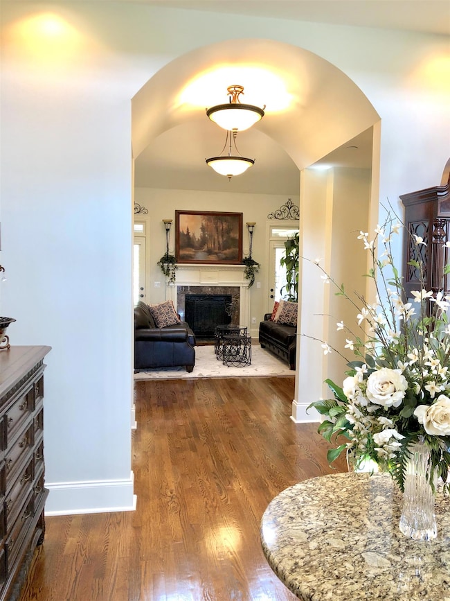Beautiful Entry Foyer with 20' Ceilings and an entry hall with barrel ceiling create a grand entrance as you walk in.