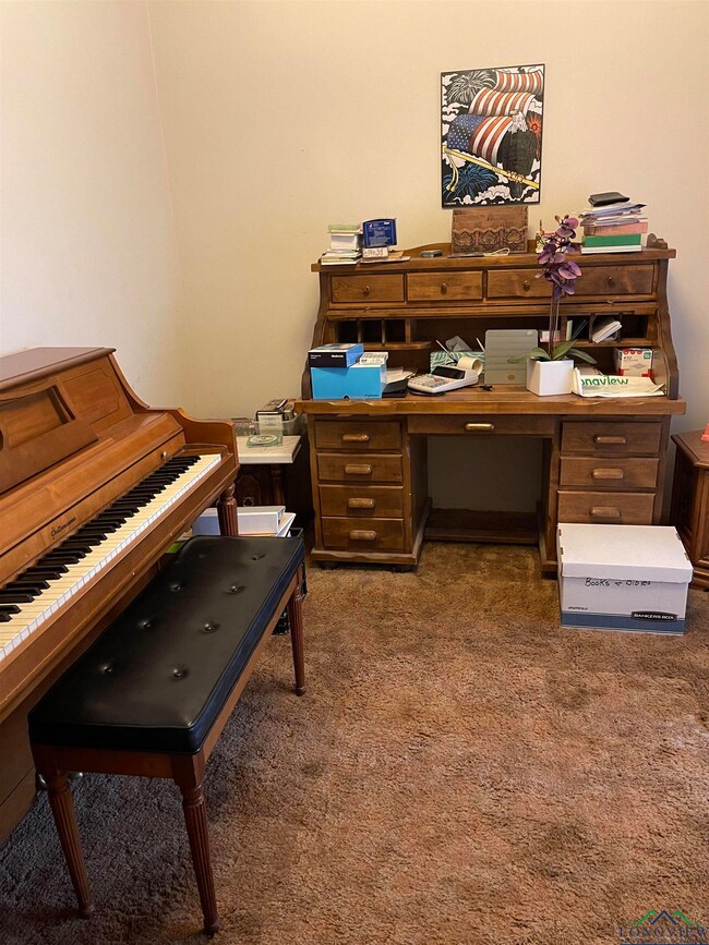 Interior space featuring dark carpet