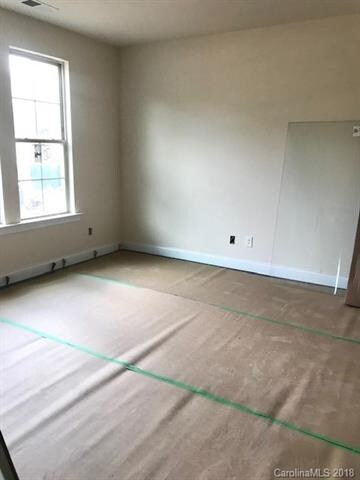 First floor guest suite with full bathroom and wal