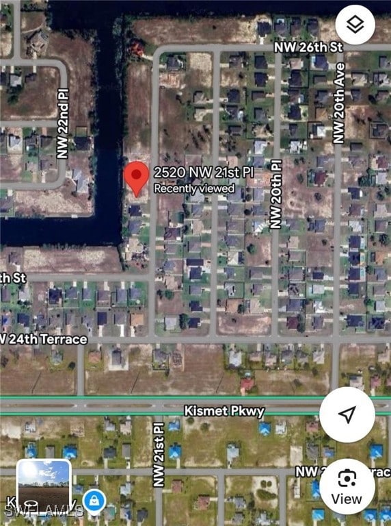 Aerial view of property's location featuring prope