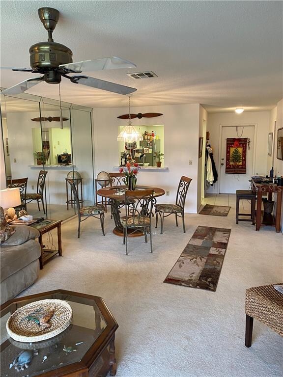 Great room view back to the dining, front door and