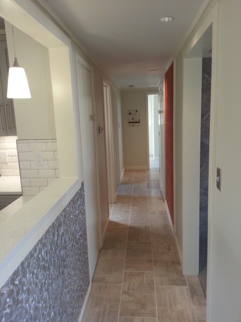 HALLWAY TO BEDROOMS AND BATH