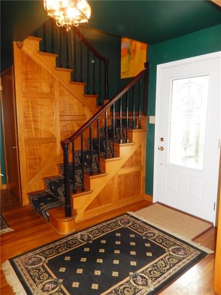 Hard wood floor entrance welcomes family and frien