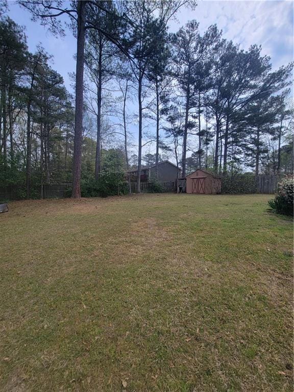 Unfurnished sunroom with a ceiling fan and carpet