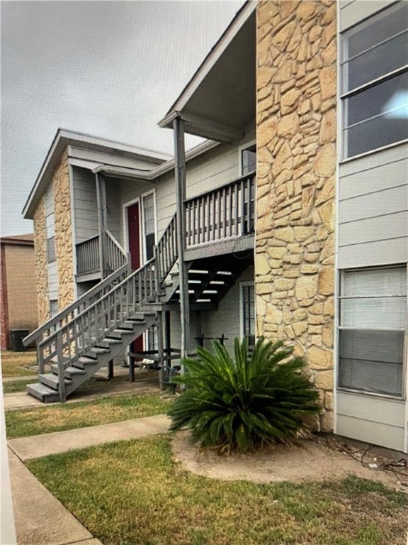 View of building exterior featuring stairs