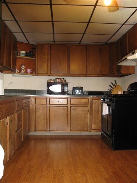 KITCHEN HAS NEW COUNTER AND FLOORING