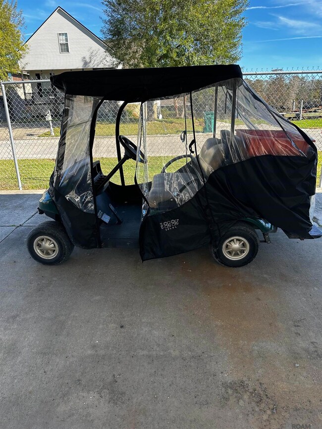 This is the golf cart potential buyers will use to get to the home.