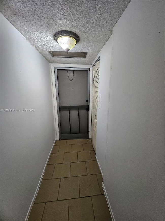 Entrance has a screened door as well