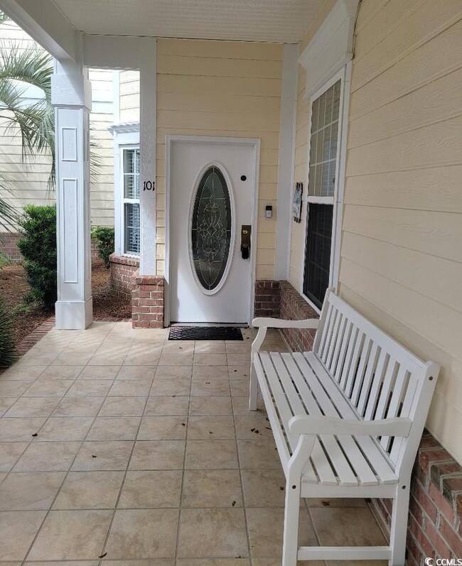 Doorway to property with a patio