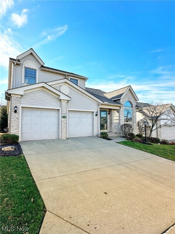 View of front of home with a garage