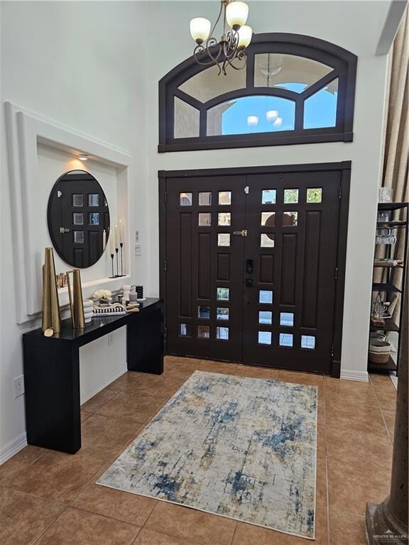 Immediately walking into the home you area greeted with 2 large doors and a welcoming built in niche.